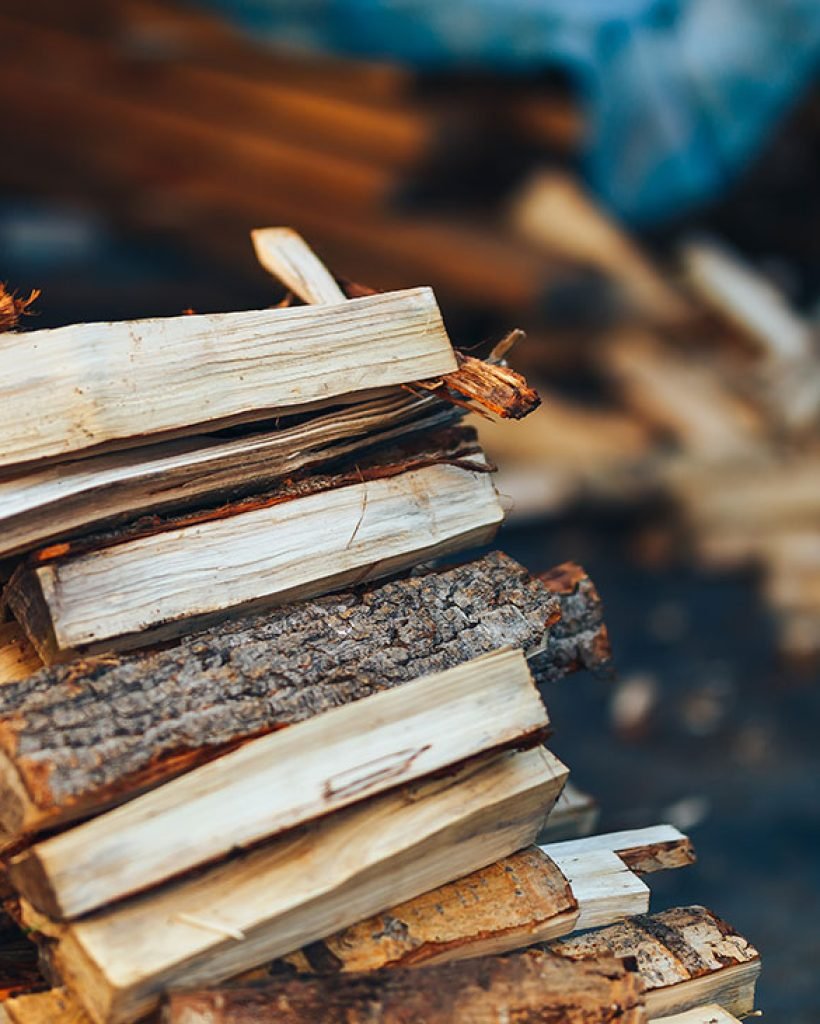 a-pile-of-stacked-firewood-prepared-for-heating-t-2023-11-27-05-12-51-utc